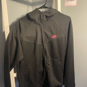 Nike Women’s Performance Jacket in Black with Pink Accent